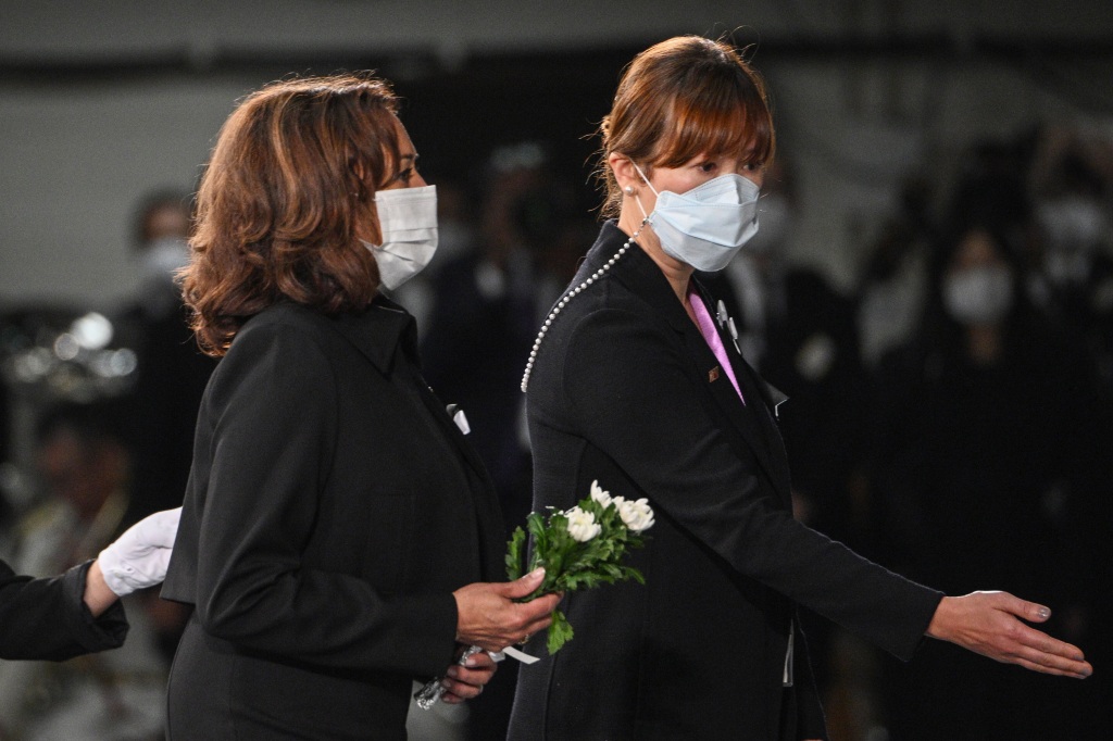 Vice President Kamala Harris prepares to offer flowers at the state funeral for Shinzo Abe on Sept. 27, 2022.
