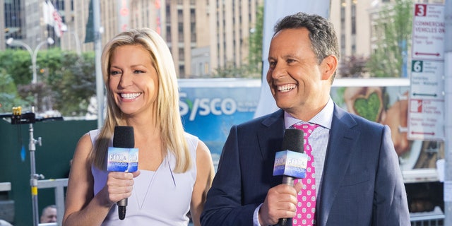 Ainsley Earhardt, along with cohost Brian Kilmeade, both of "Fox and Friends," on Fox Square in Midtown Manhattan this summer.  