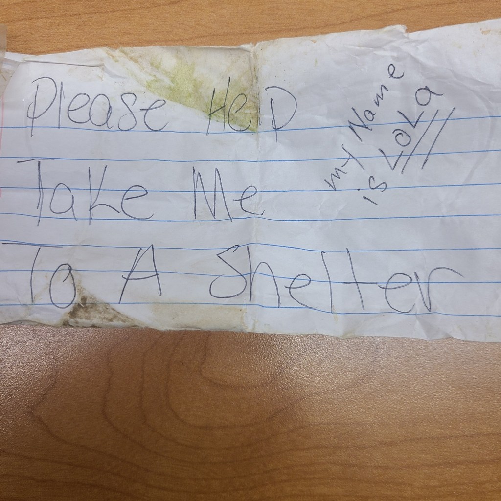The note attached to her asked officers to 'please help' and take her to shelter. 