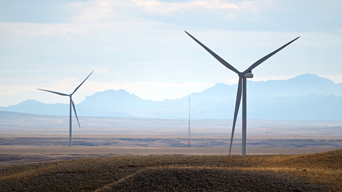 Wind electric power generation turbines generate electricity outside Medicine Bow, Wyoming on August 14, 2022.